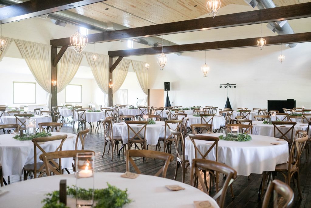 reception space decorated with greenery at Lilydale Dance Hall & Event Venue in Chippewa Falls