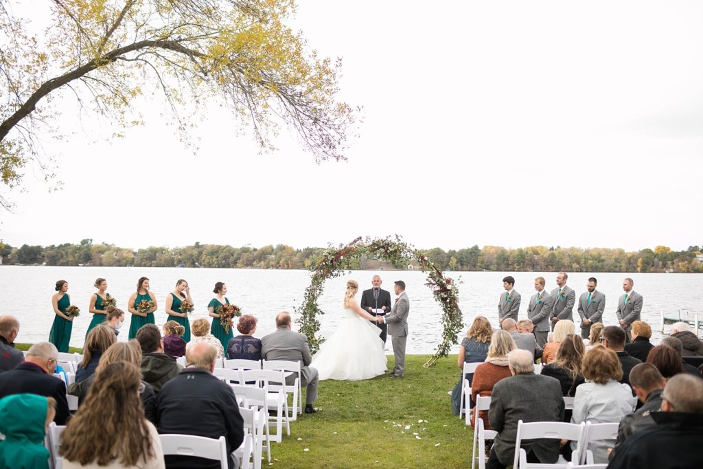 wedding ceremony on the lake at a wedding at Lake Wissota Golf & Events
