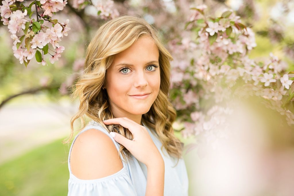 Spring blossoms are so hard to predict, but they made for a beautiful spring blossom senior photos in Eau Claire, WI.