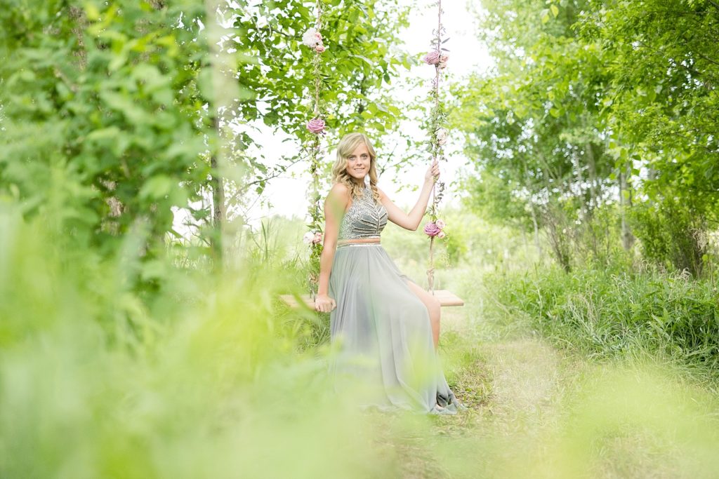 Spring blossoms are so hard to predict, but they made for a beautiful spring blossom senior photos in Eau Claire, WI.